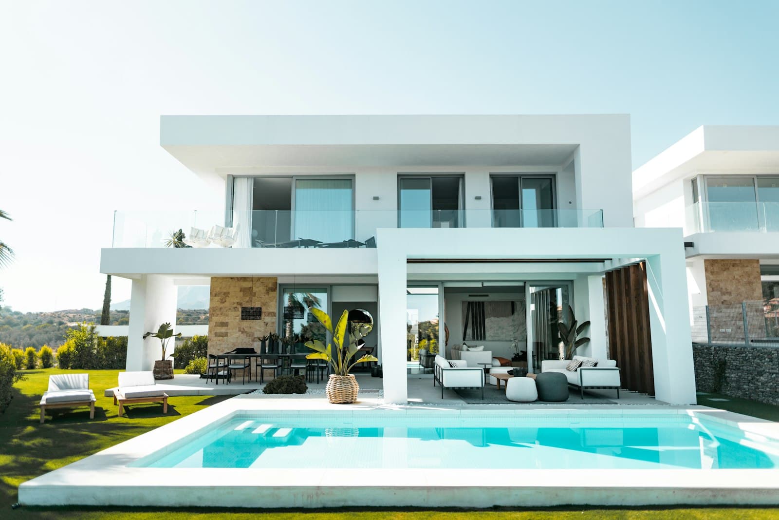 Villa terrace and pool at the rear of a family house, West Village, Dubai